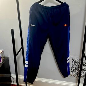 Ellesse L dark blue navy and white track pants athletic running gear zip pockets